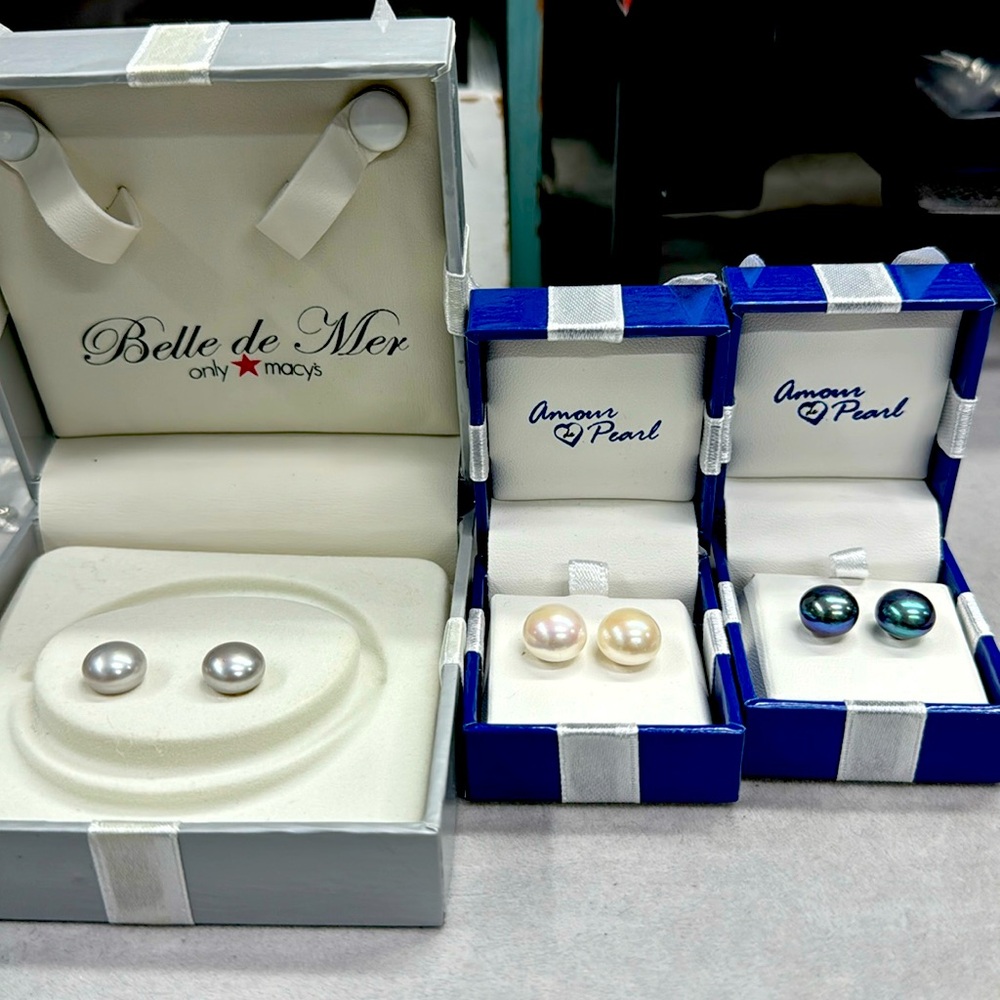 Three pairs of pearl earrings